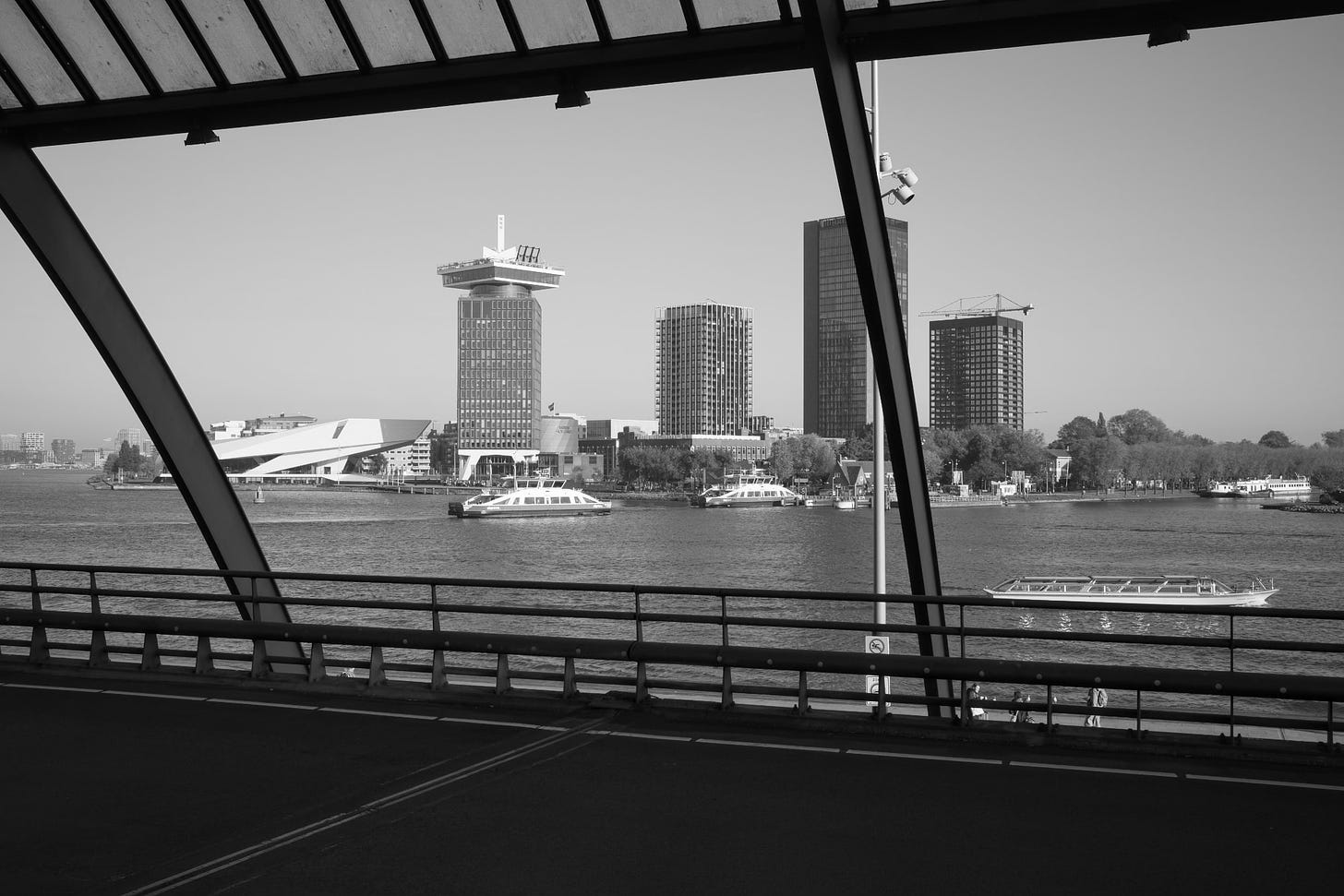 A photo of the Amsterdam skyline from the bus station