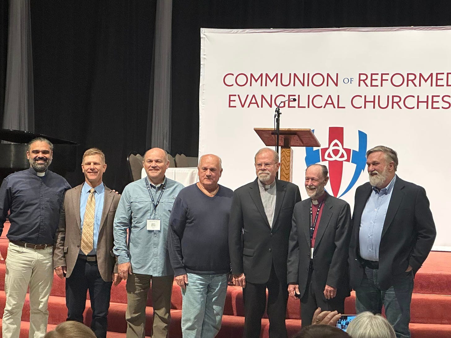 May be an image of 7 people and text that says 'COMMUNION OF REFORME EVANGELICAL CHURCHES'