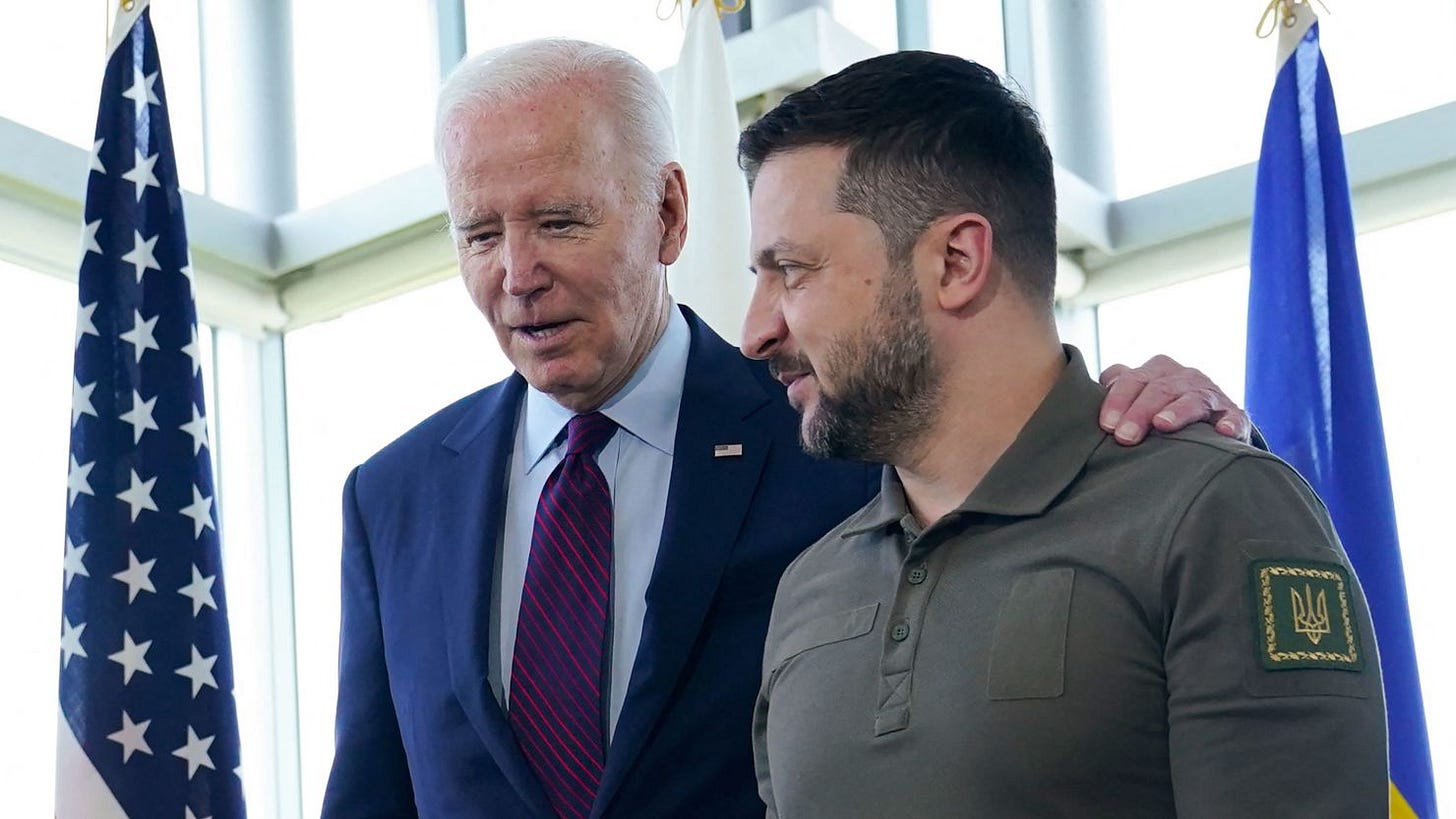 President Joe Biden walks with Ukraine's President Volodymyr Zelensky ahead of a working session on Ukraine during the G7 Leaders' Summit in Hiroshima on May 21, 2023. 