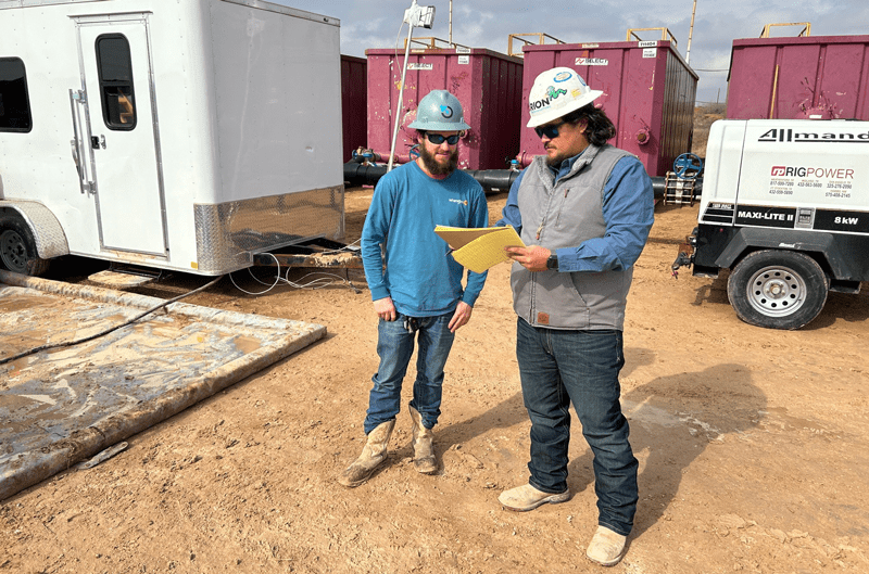 From left to right: Tee Jay Hayes, Operator, and Anthony Yanez, Field Supervisor, verifying data at a produced water recycling location. Photos courtesy of XPC Water Solutions.