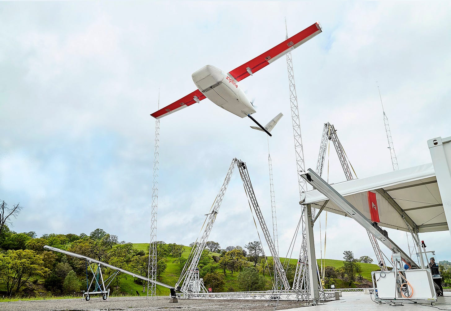 Zipline drone taking off from Zipline distribution center