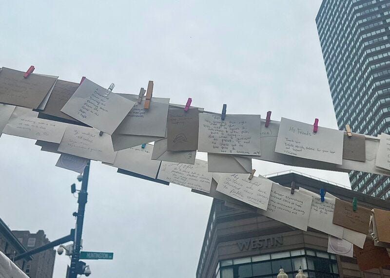 Image of handwritten notes hung in the air from visitors.