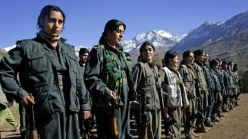 PKK guerillas at roll call in the mountains of northern Iraq.