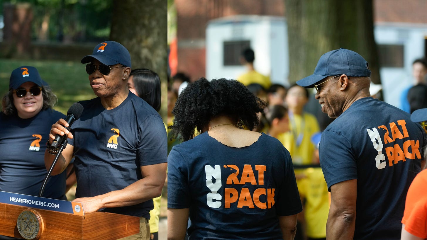 Eric Adams wearing an NYC Rat Pack shirt. In the logo, the R has a rat's face to make the top space