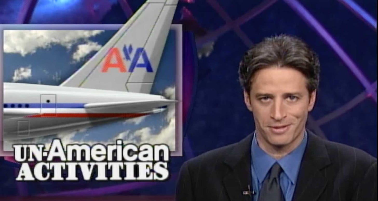 Jon Stewart on the Daily Show set next to an image of an American Airlines plane with the headline unAmerican Activities.