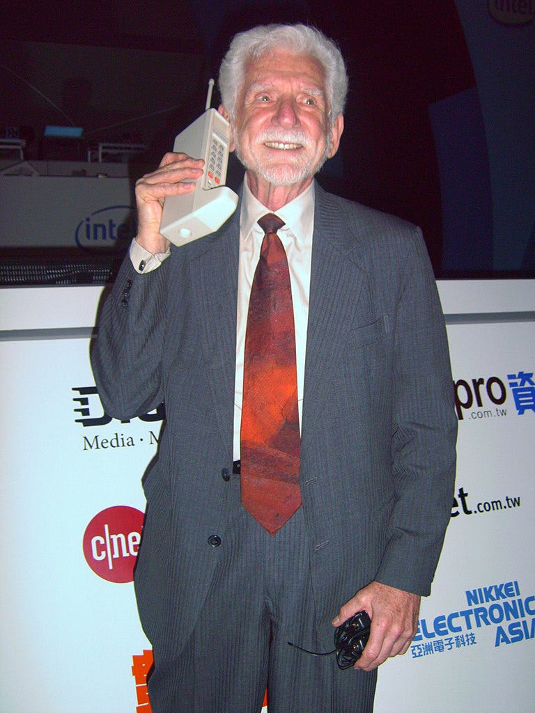 _Marty Cooper in 2007 with the first cell phone_ Image courtesy Rico Shen ([CC BY-SA 3.0], via Wikimedia Commons)_