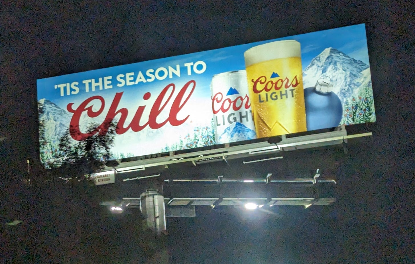 A Coors Light billboard with the headline 'Tis the Season to Chill