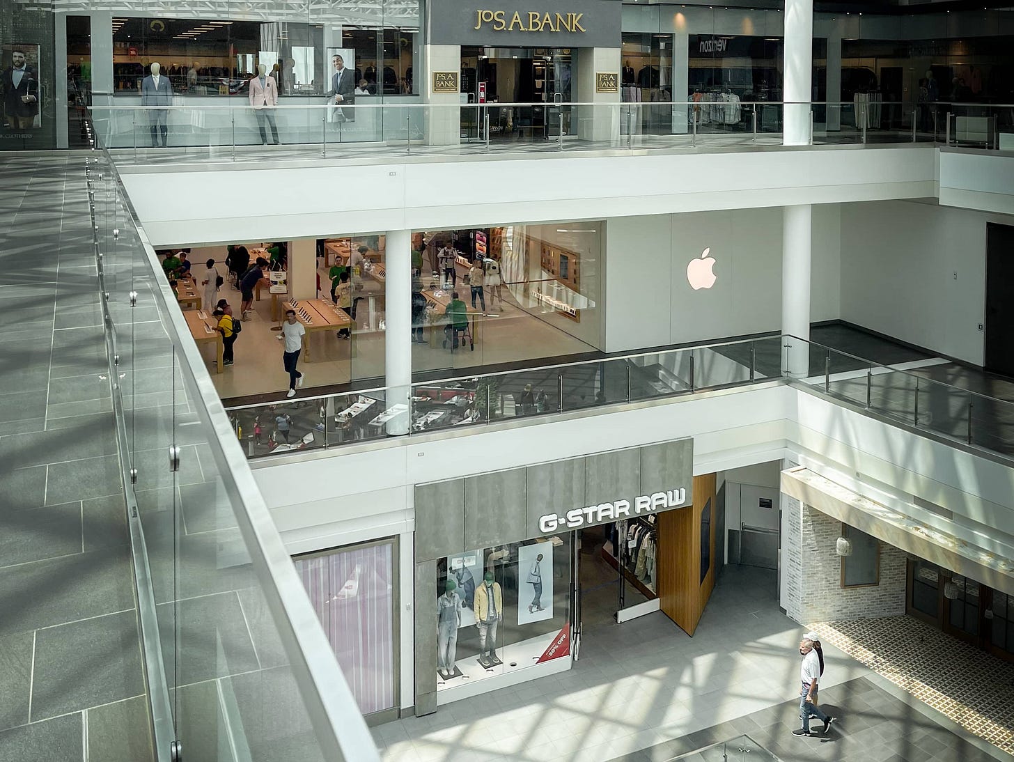 Apple Pentagon City photographed from an upper level. Neighboring tenants are above and below on several levels. One of them is Victoria's Secret.