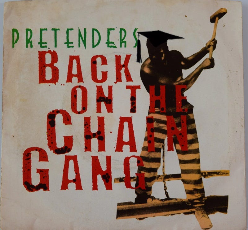 old record sleeve for the Pretenders' 'Back on the Chain Gang,' with a graduation cap and tassel photoshopped onto the photo of a convict swinging a sledgehammer