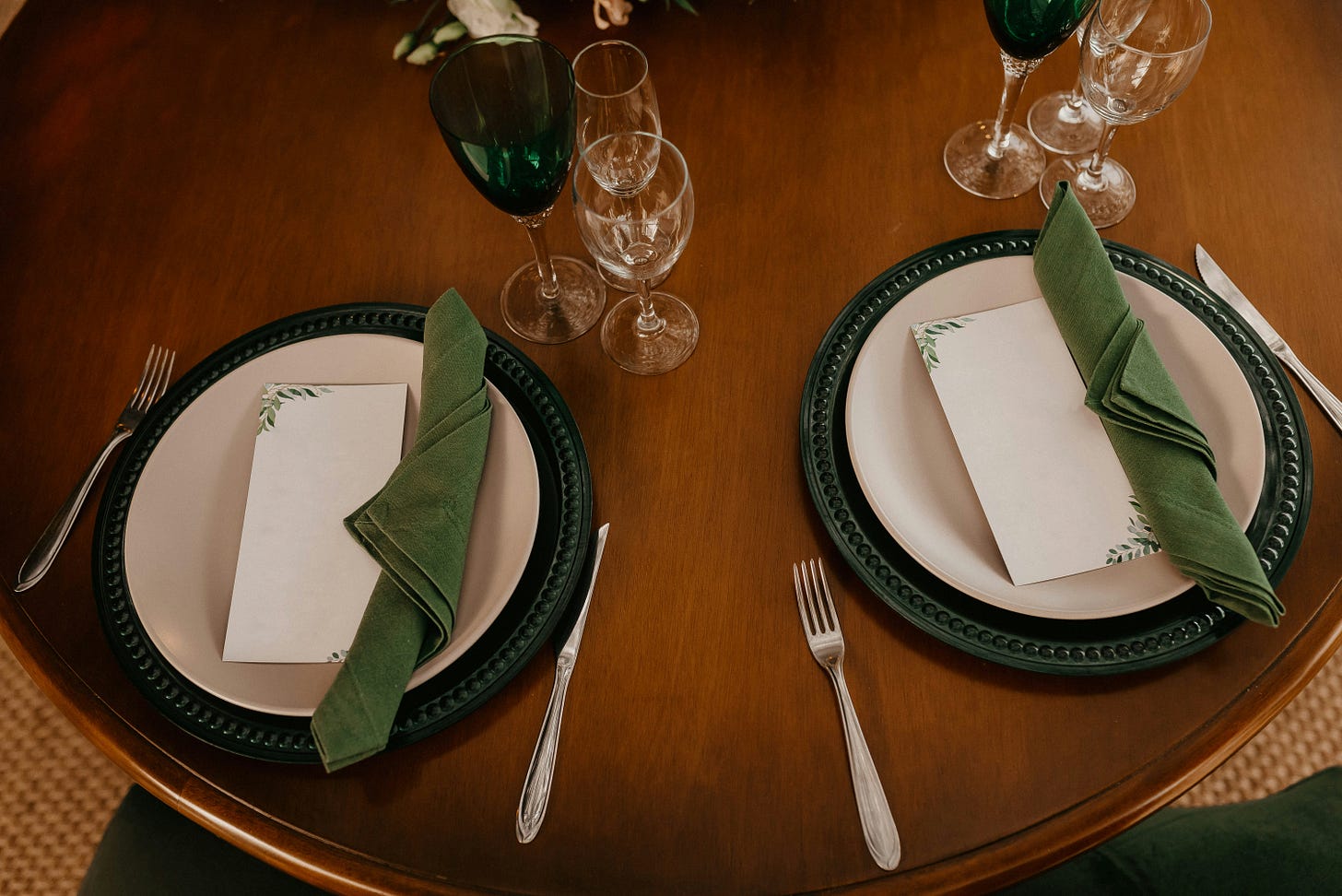 Two dinner plates at a table