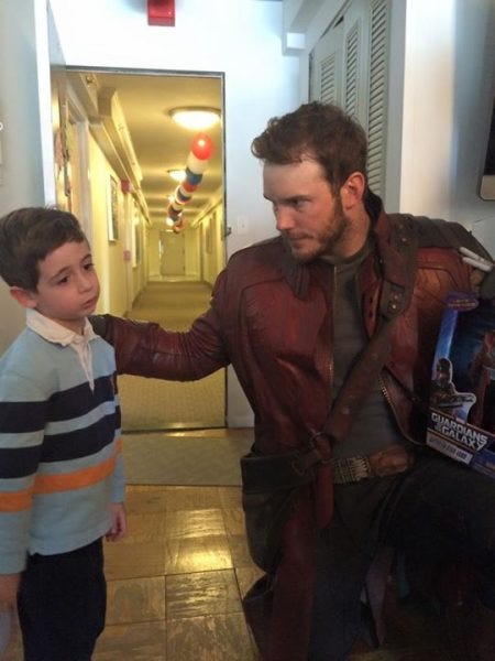 chris pratt star lord touching child shoulder for super bowl bet