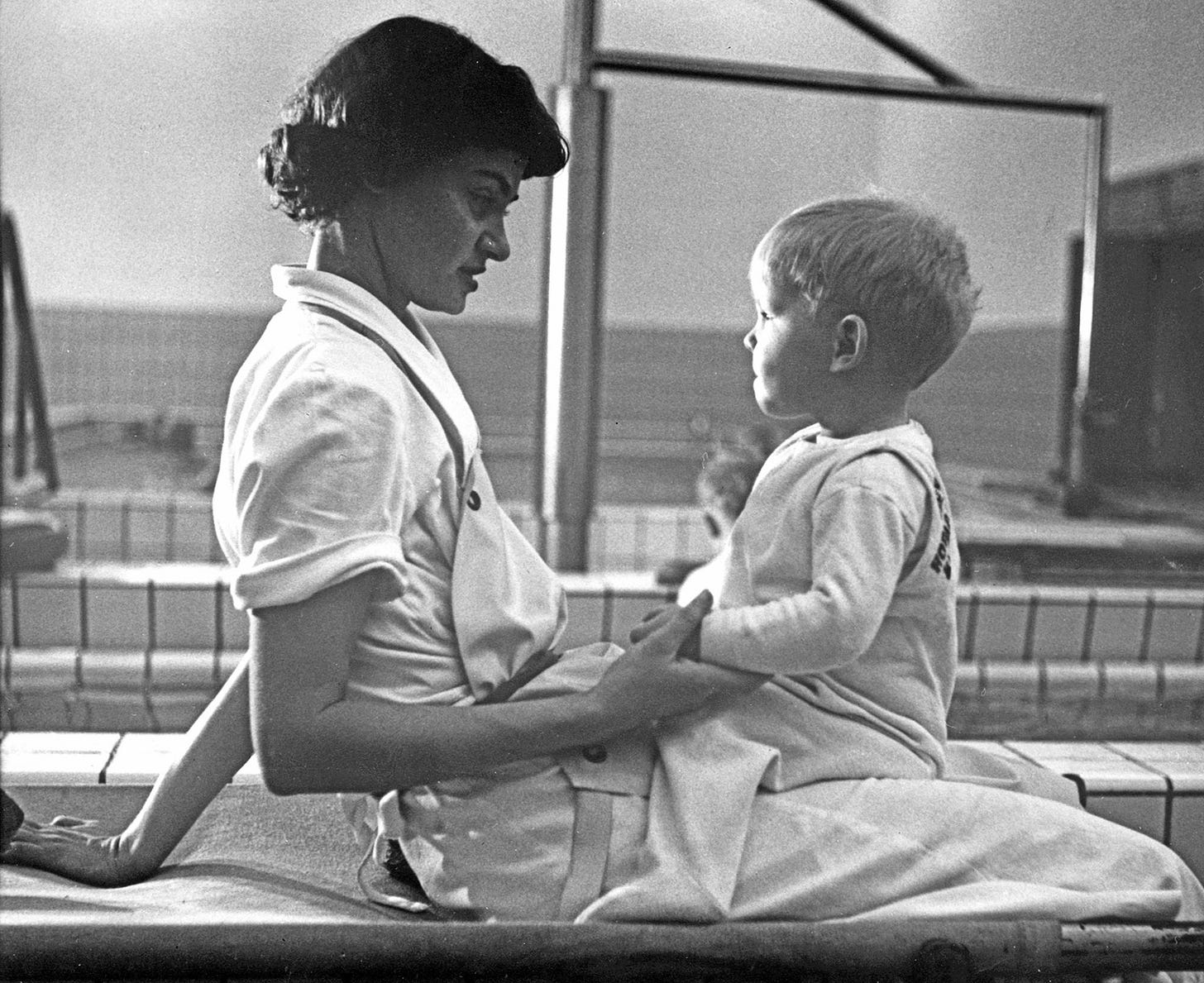 A nurse telling a bedtime story to a child