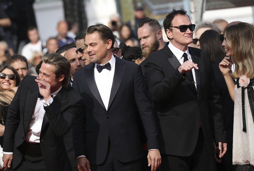 quentin tarantino with leonardo dicaprio brad pitt at cannes once upon a time