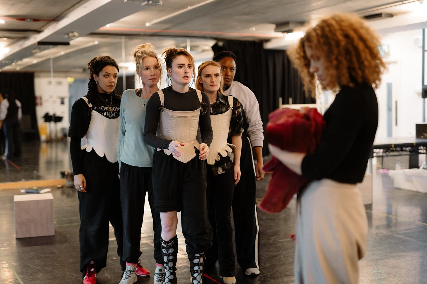 A photo showing the cast of Mary and the Hyena's in rehearsal