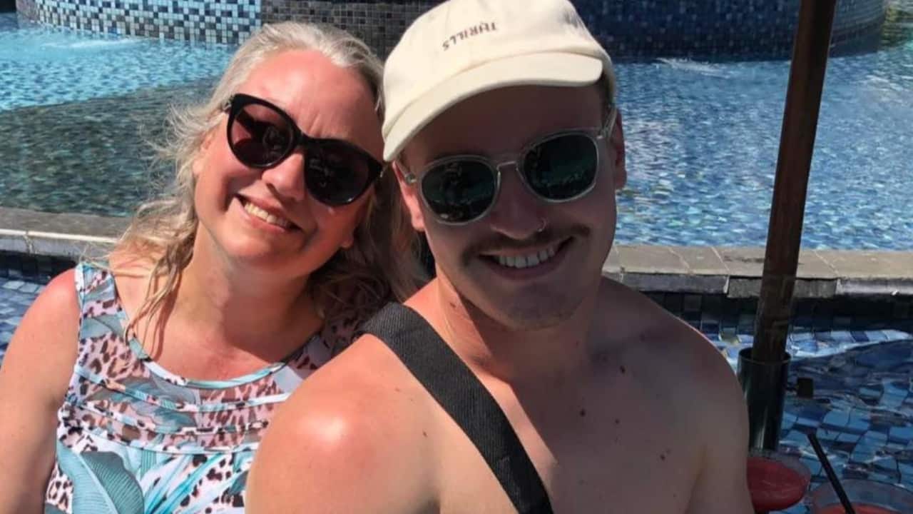 Stacey Chater and her son Brayden together by a pool.