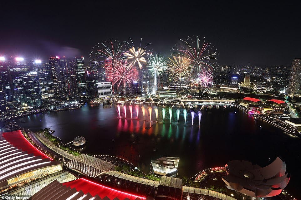 SINGAPORE: Fireworks light up the sky ahead of the new year countdown on December 31, 2024 in Singapore
