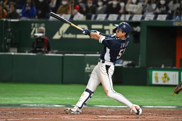 Jung Hoo Lee of Team Korea RBI double to make it 2-10 in the third inning during the World Baseball Classic Pool B game between Korea and China at...