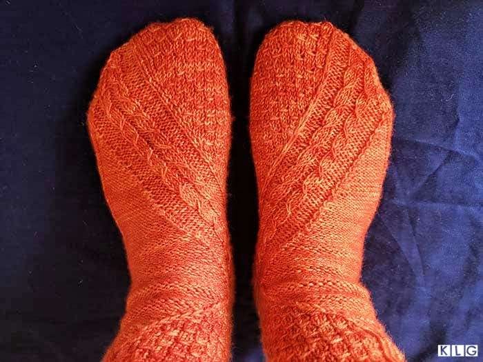 Two socks complete. So happy with my Smaug socks