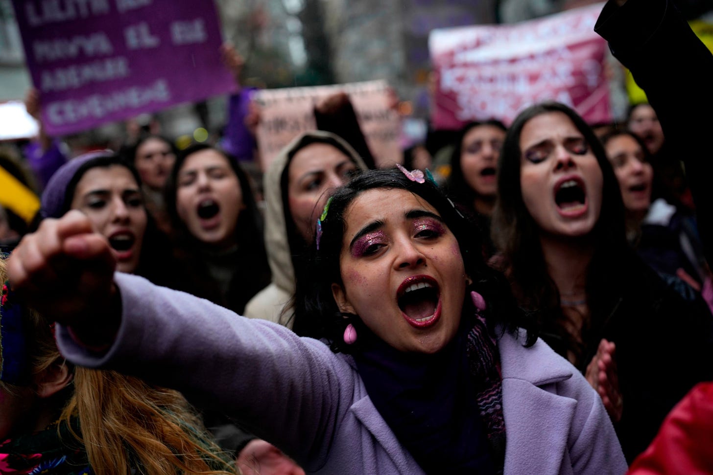 PHOTO: Women shout slogans during a protest to mark International Women's Day in Istanbul, Turkey, March 8, 2024. 
