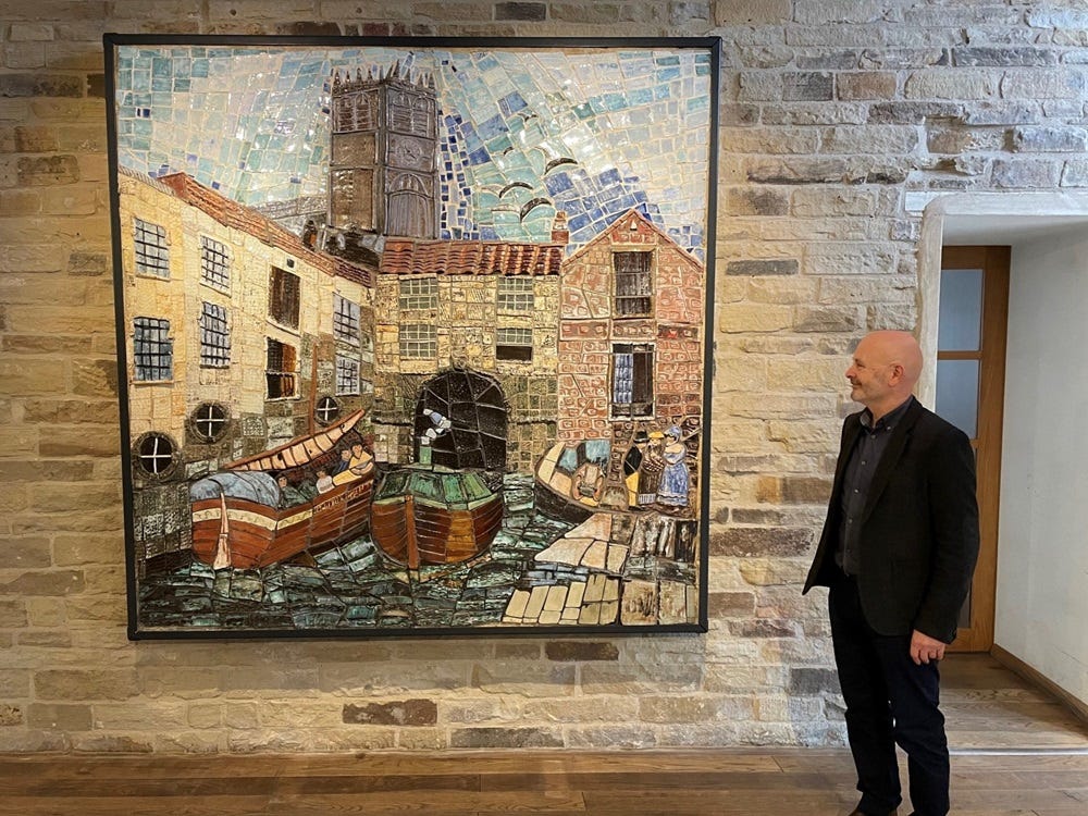 Paul Egan with the mural by Grete Marks