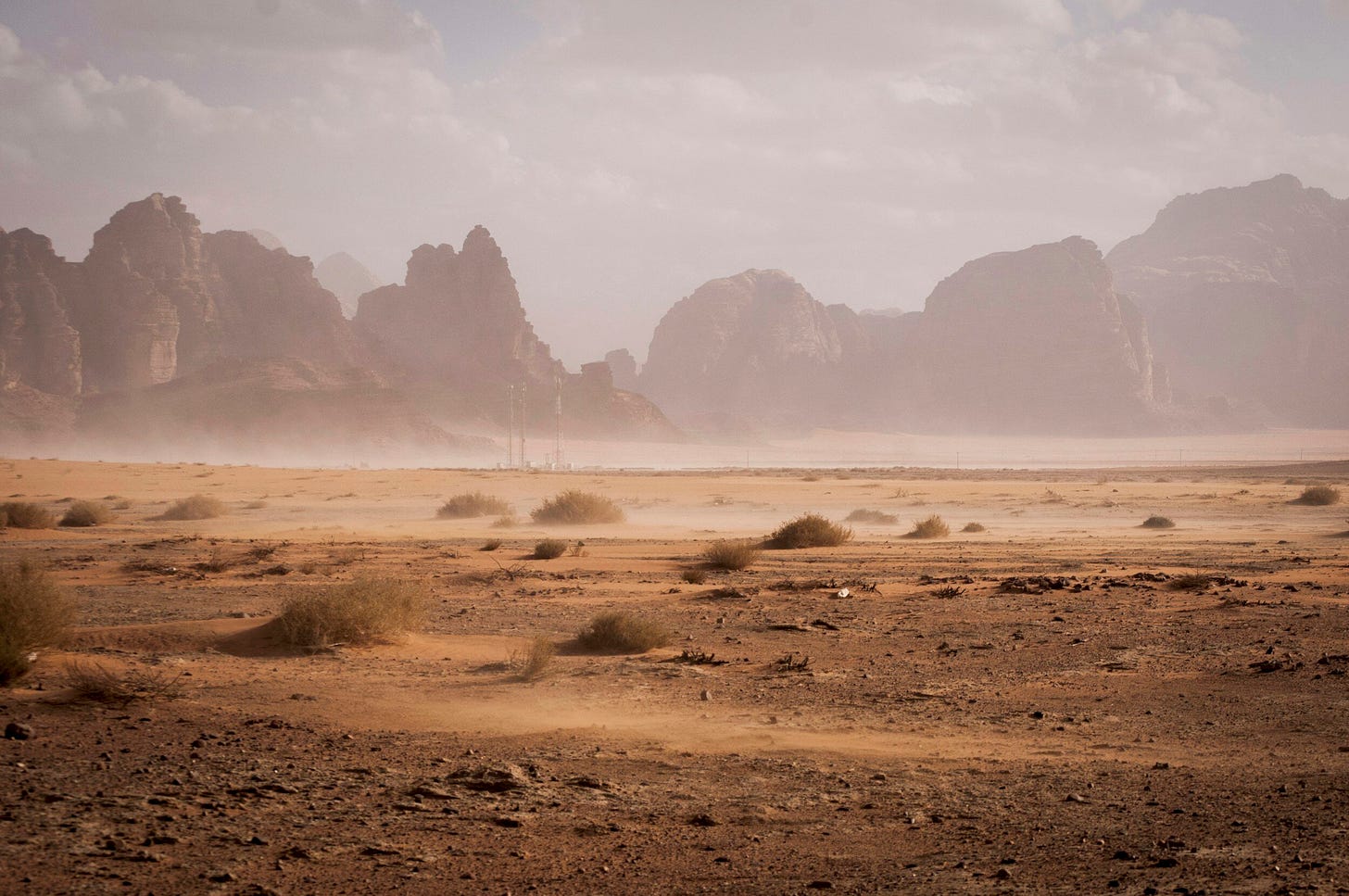 the desert with a cloudy sky