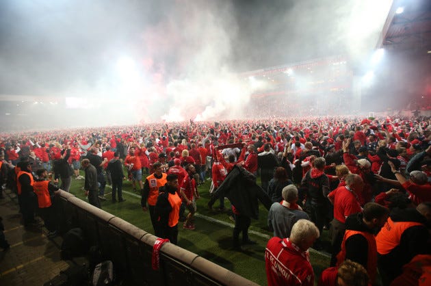 Brilliant scenes as fans invade pitch after Berlin club claim promotion to  Bundesliga for the first time