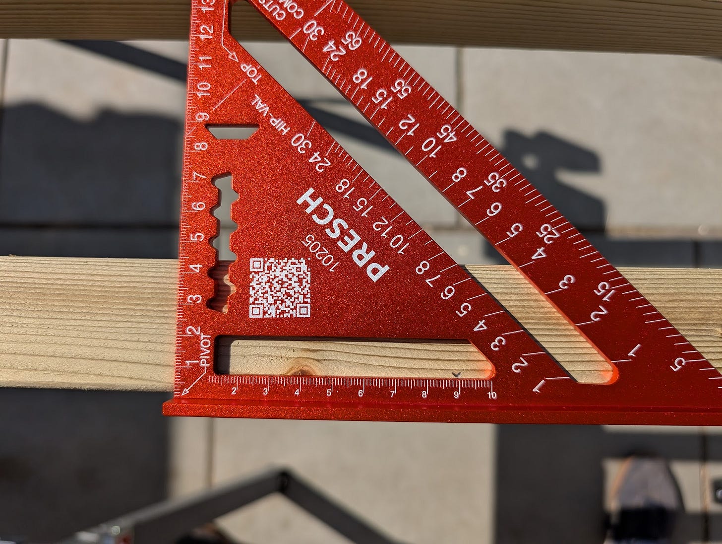 Using a carpenter's square to measure in 90mm to get the final length.