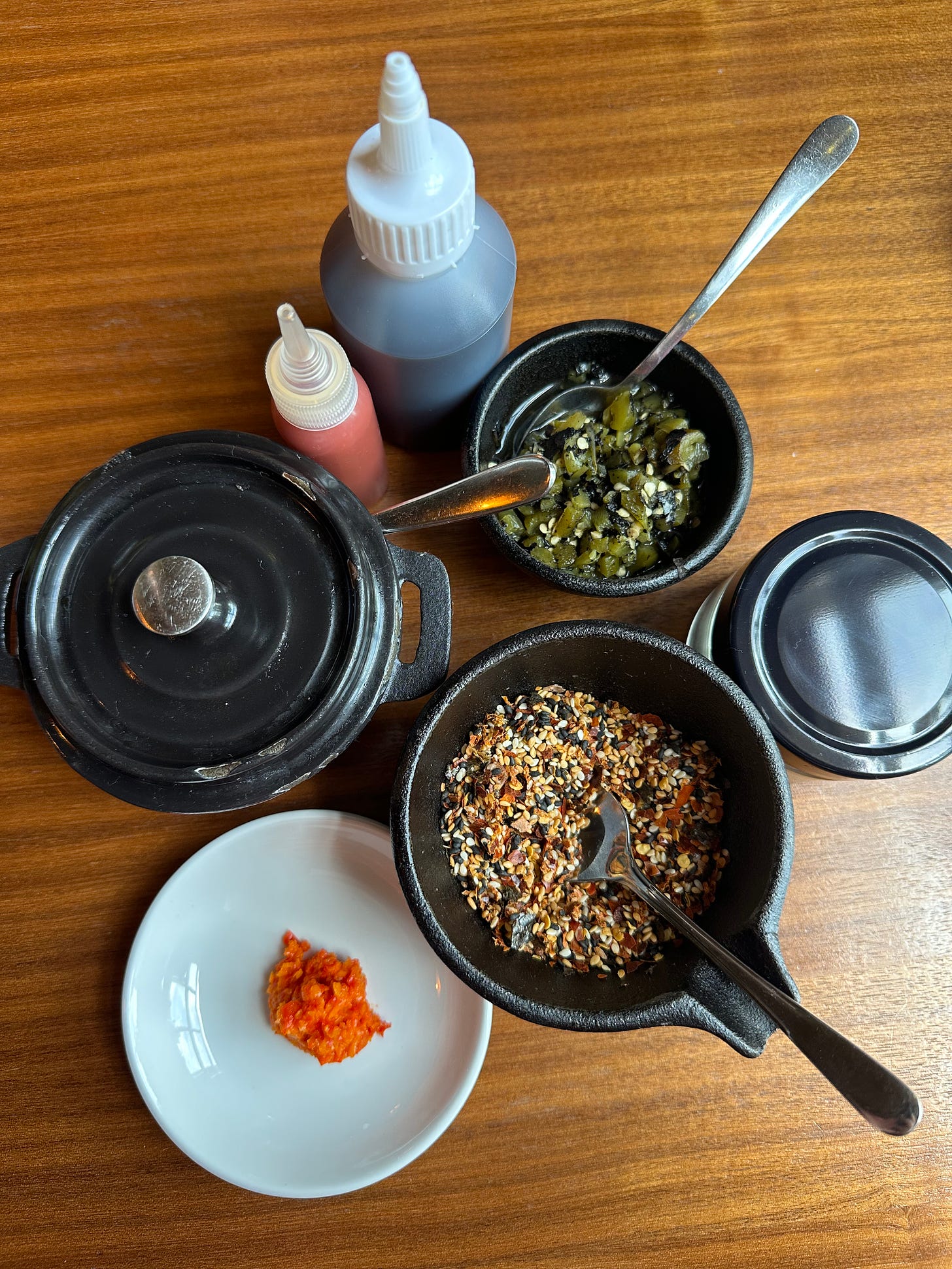 The selection of toppings and seasonings at The Lotus Eaters