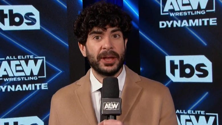Tony Khan during a backstage announcement in AEW
