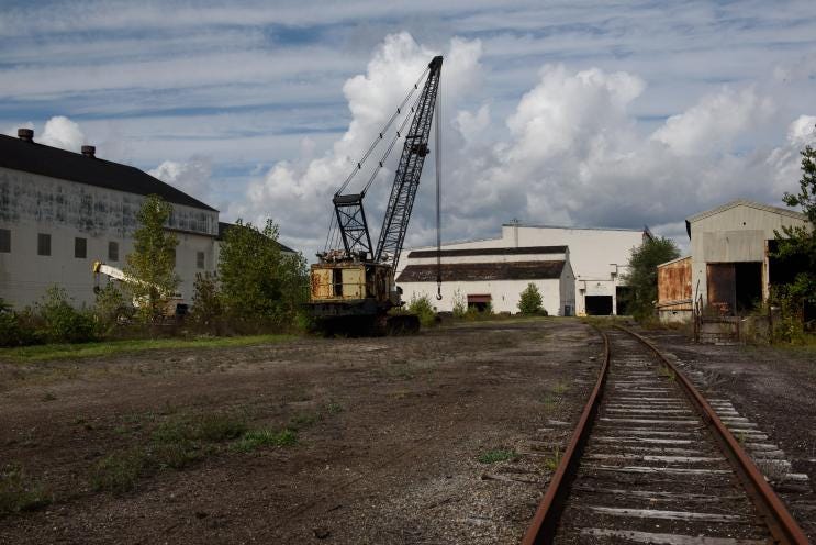 Rusty remains and railroad tracks sit quiet at the Casey Industrial Park, once the Campbell Works of Youngstown Steel and Tube in Struthers, Ohio.