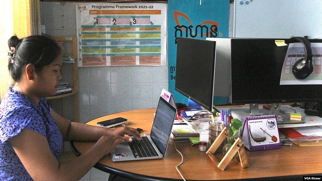 Mao Map, Executive Director of Klahaan, an independent organization that campaigns for women’s rights in Cambodia, works in her Phnom Penh office
