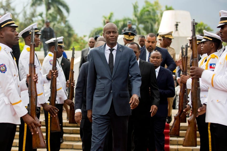 Haiti's President Jovenel Moïse leaves a museum