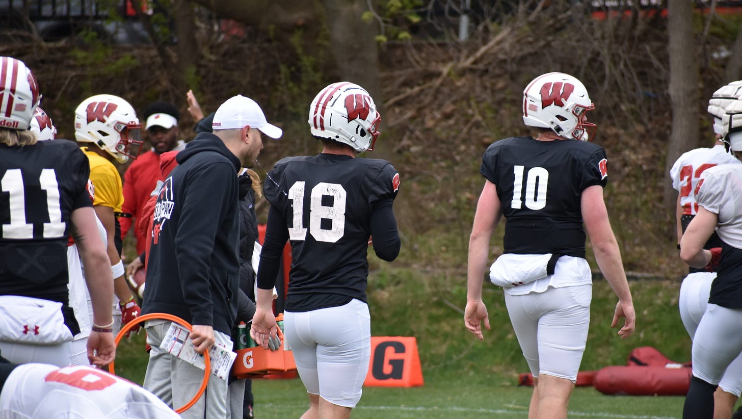 Wisconsin Badgers quarterbacks Tyler Van Dyke and Braedyn Locke at practice 