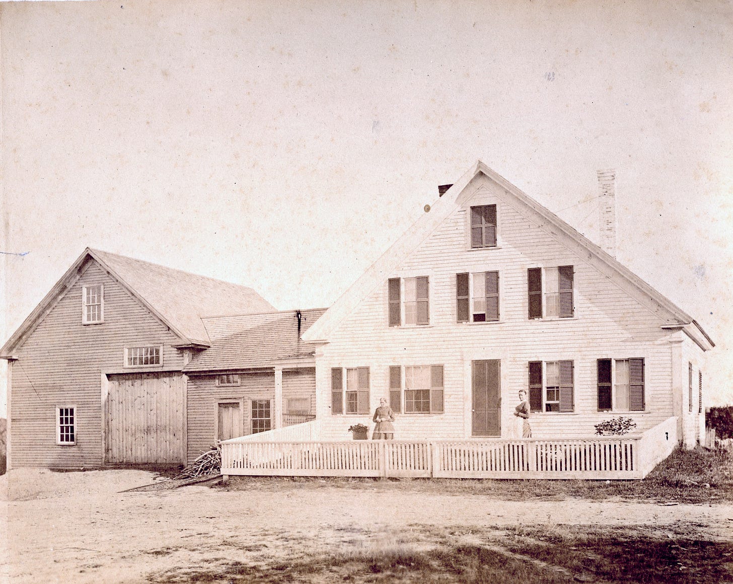 Two women with house and barn