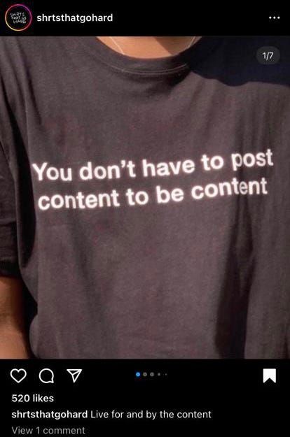Image shows an instagram post by @shrtsthatgohard showing a black shirt with white letters reading "You don't have to post content to be content". The caption reads: "Live for and by the content", and it has 520 likes