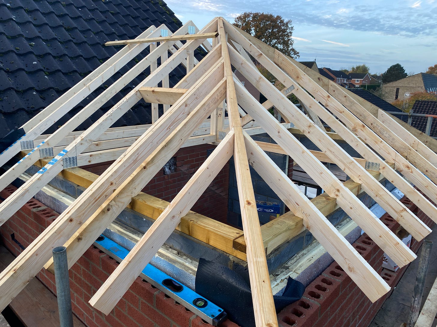 wooden roof trusses in position