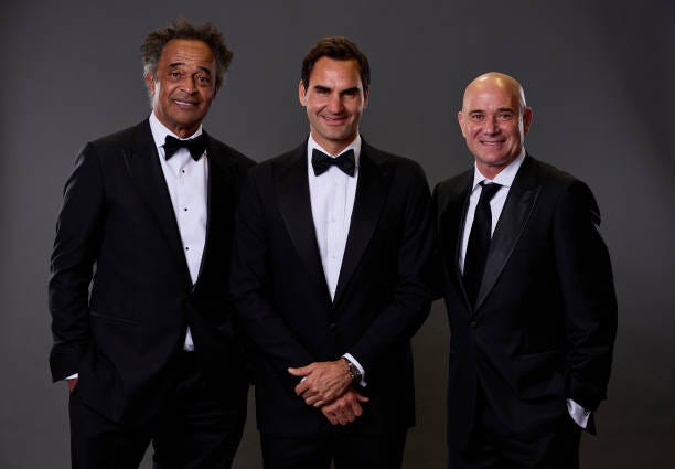 Yannick Noah, Roger Federer and Andre Agassi pose for a photograph in the photobooth during the Opening Night Gala of the Laver Cup 2024 at WECC on...