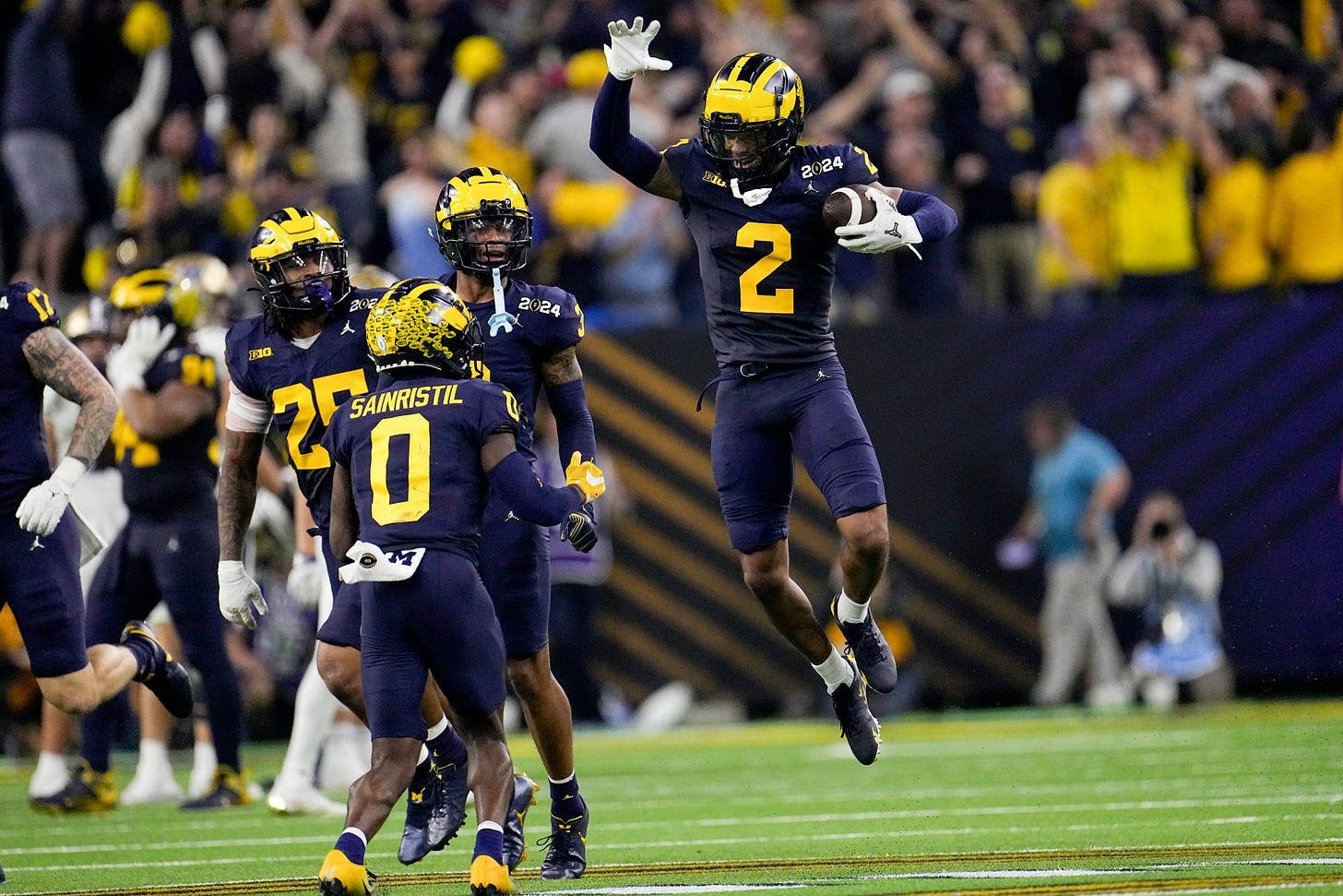 Will Johnson, Mike Sainristil and Michigan's stingy D clamps down on  Washington's deep passing game | AP News