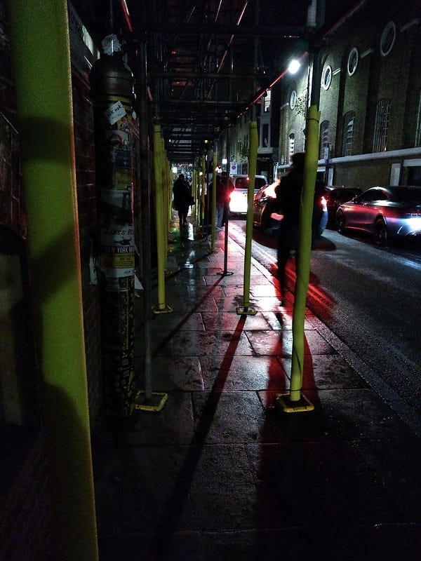 Brick Lane at night — photo by Terry Freedman
