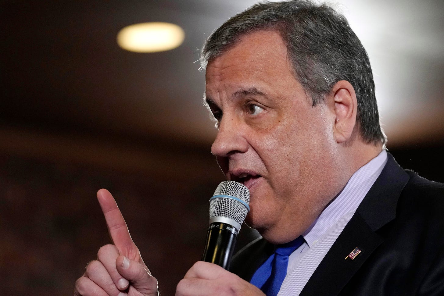 Republican presidential candidate former New Jersey Gov. Chris Christie speaks at a town hall campaign event.