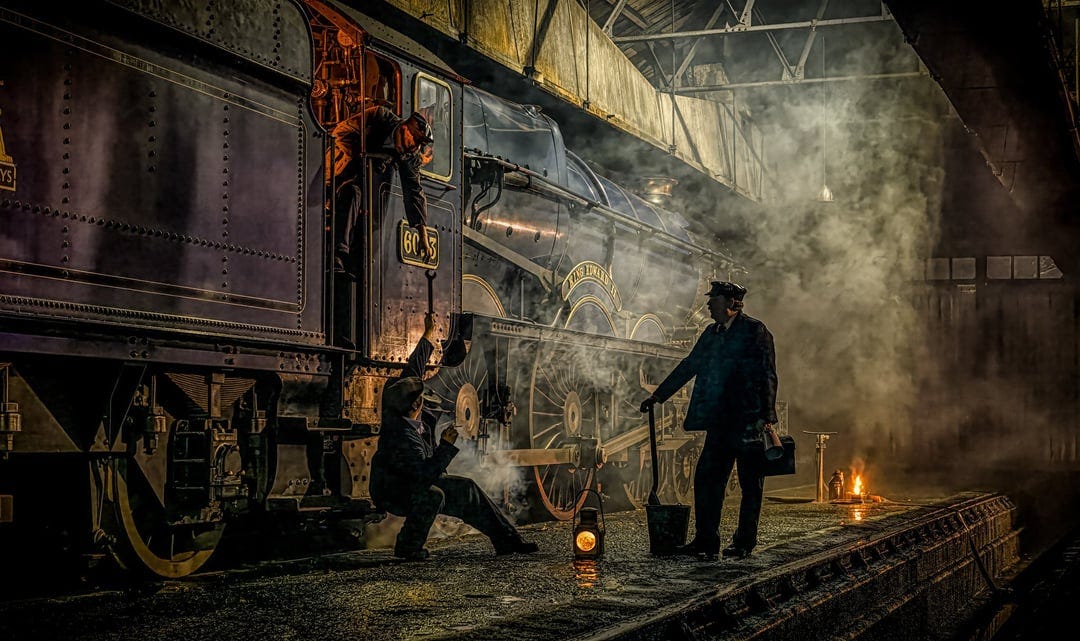 Cool image of a steam train in the shop. Can't quite tell if this is a  picture or artwork. : r/trains