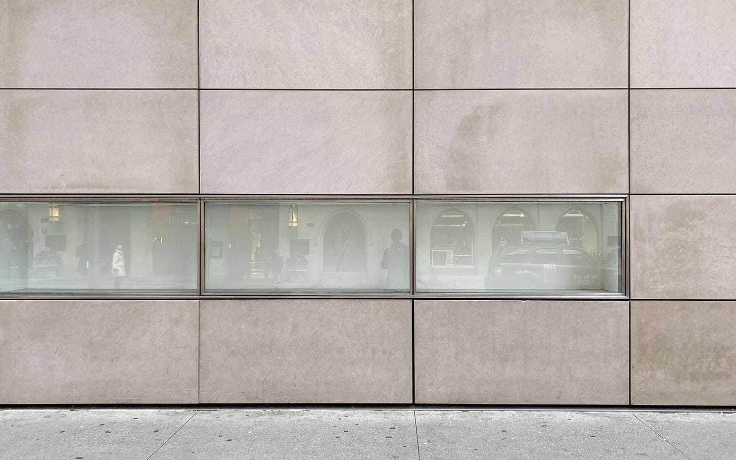 An empty graphic panel lightbox on the exterior of the former Apple North Michigan Avenue.