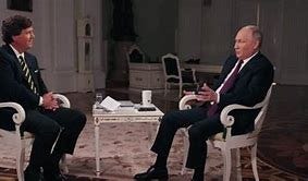Image result for tucker carlson and putin images