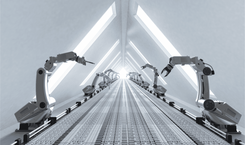robotic arms along assembly line in a long white room while productivity can help avoid multitasking and focus on one task at a time