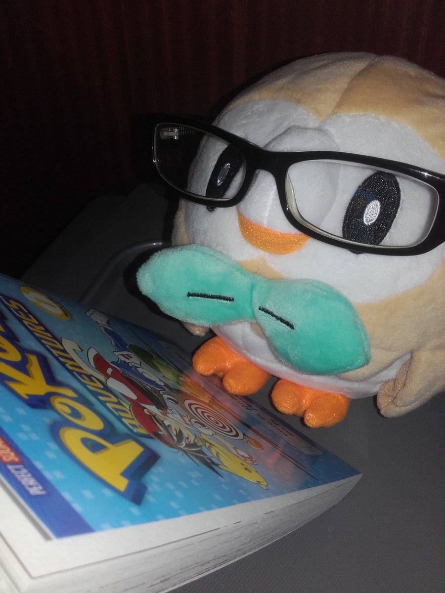 Rowlet reading the Pokémon Adventures manga (Photo credit: Johto Times)