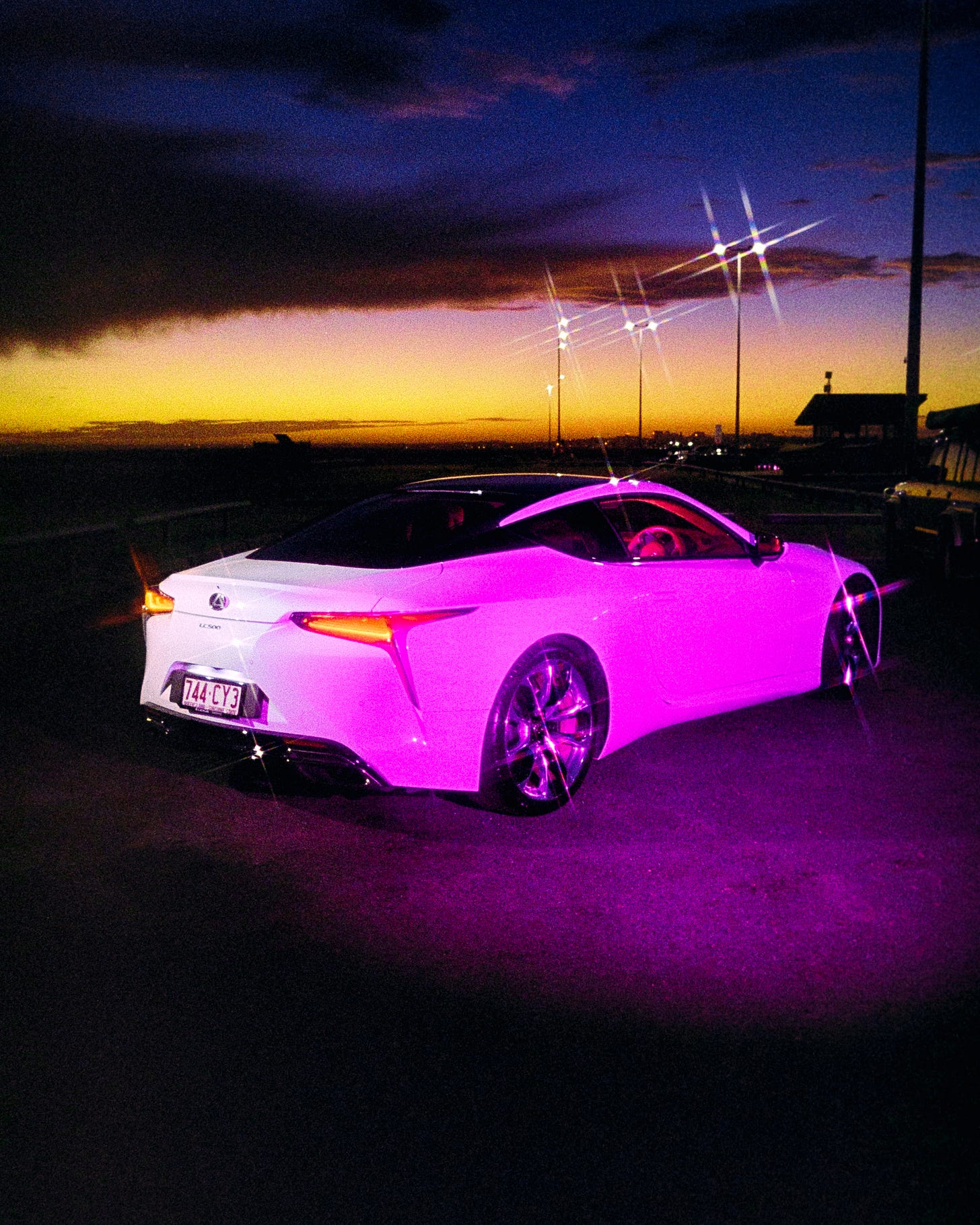 A very vibrant film shot of Clem's car, lit up by the X60 light, with the lingering sunset in the background. The filter used created dramatic starbursts on any highlighted area.