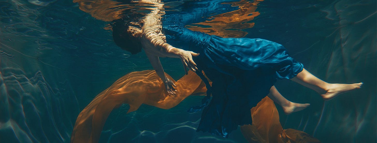 Cover image for the audio series Pariah shows an image of a woman's body floating in the water on her back. She is wearing a blue dress.