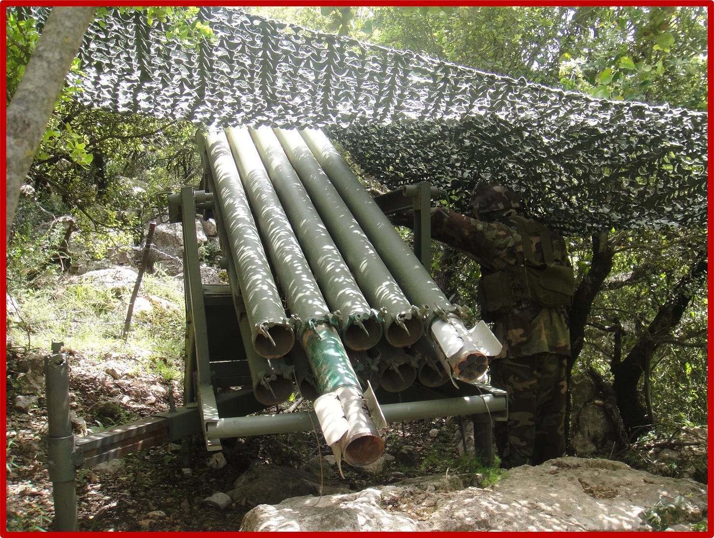 This is an image of a rocket launcher in the "Nature reserves" are of the South Lebanon countryside. The rockets look very crude and easy to produce.