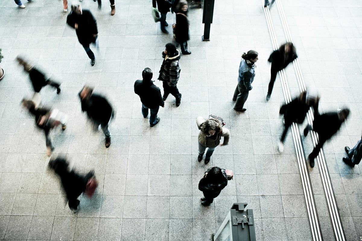People standing and walking People standing and walking