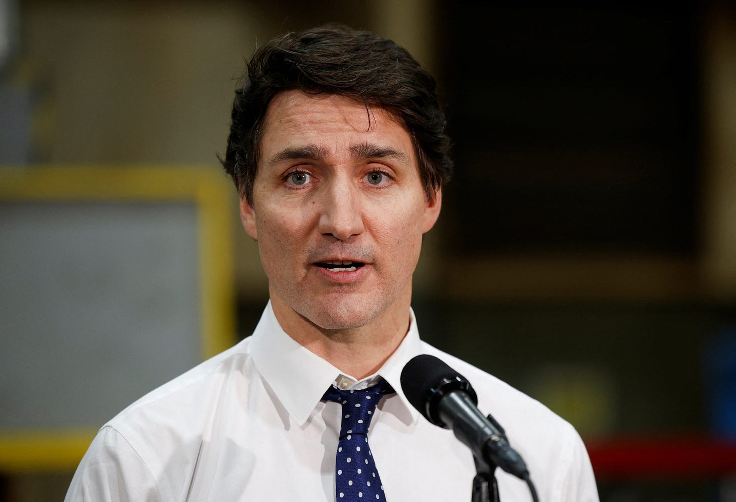 Canada’s Prime Minister Justin Trudeau speaks to the media after touring the Anchor Danly manufacturing plant in Windsor, Ontario